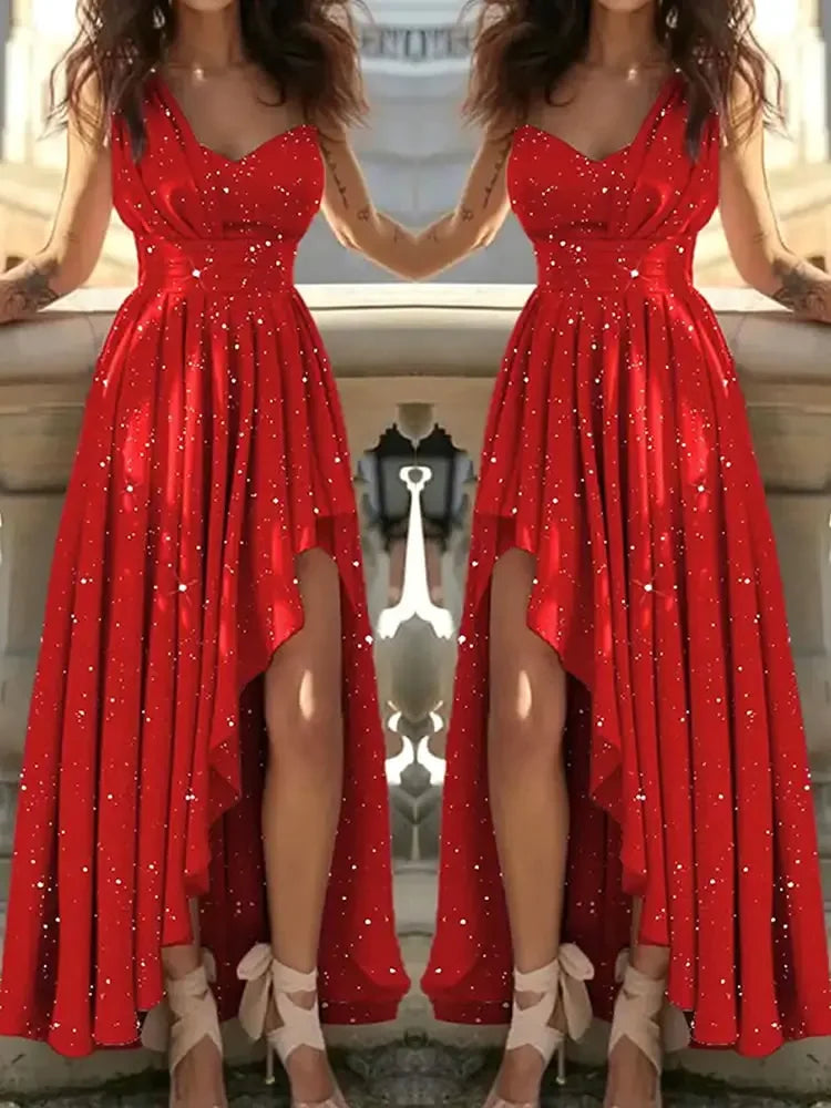 Red satin-feel maxi dress with a V-neck, pleated bodice, and high-low skirt with a dramatic thigh-high slit.