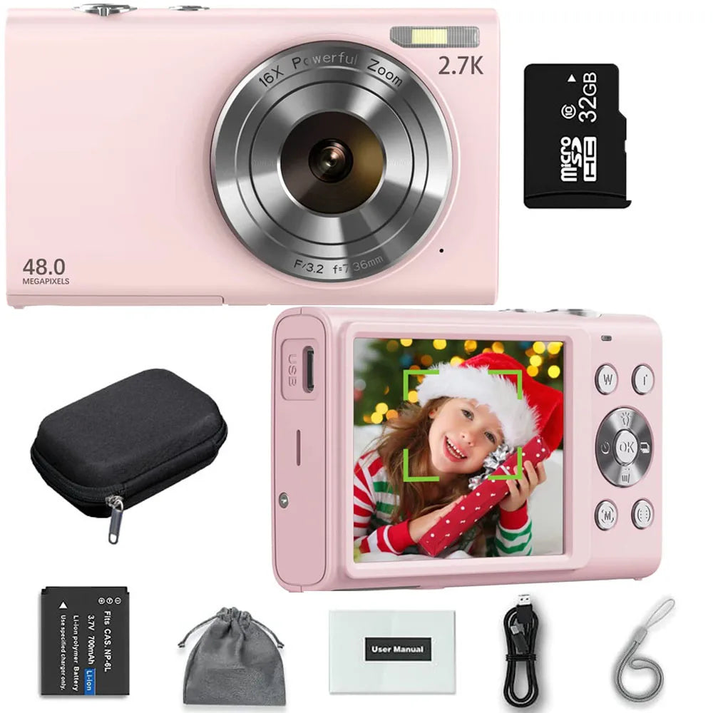 Pink 48MP digital camera with 16x zoom, 32GB SD card, battery, carry case, cables, and user manual.