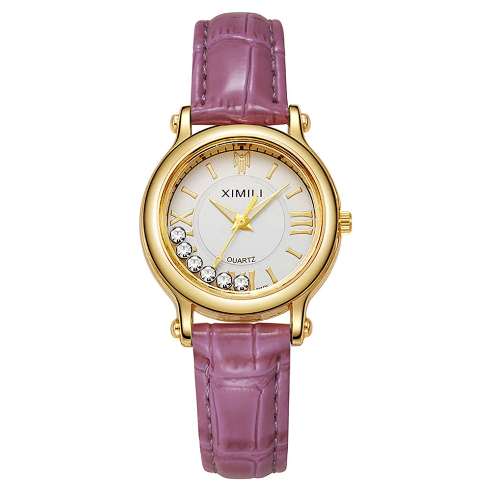 Women's gold-tone quartz watch with a white dial, crystal accents, and a mauve croc-effect leather strap.