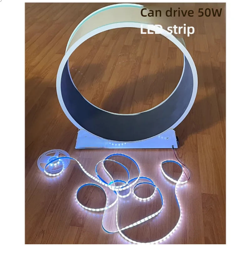 White interactive pet exercise wheel on a wooden floor, shown with a connecting bright LED light strip.