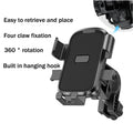 Black car phone mount with four-claw grip, 360-degree rotation, and built-in hook for easy device access.