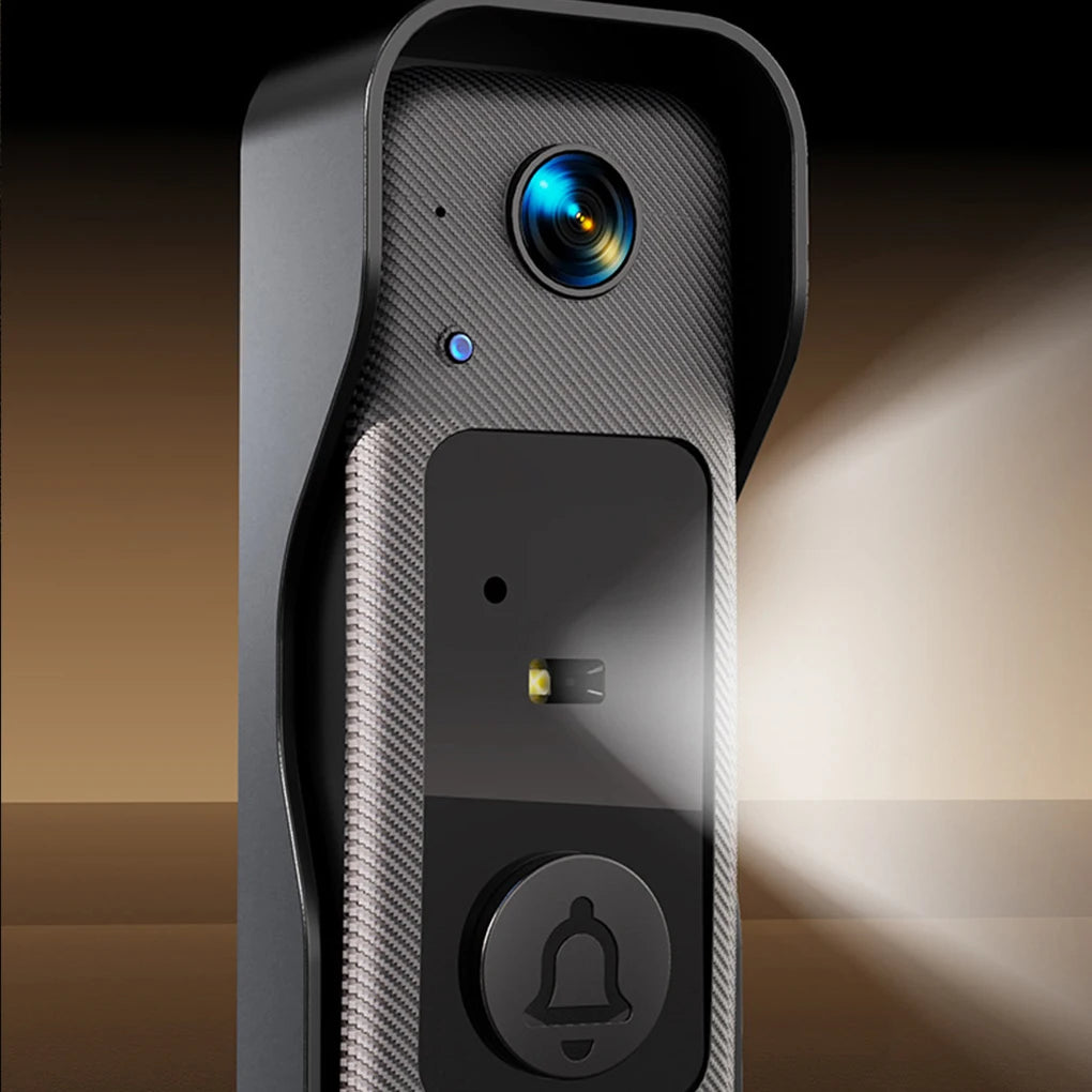 Sleek black wireless video doorbell with camera lens, integrated light for night vision, and a central bell button.