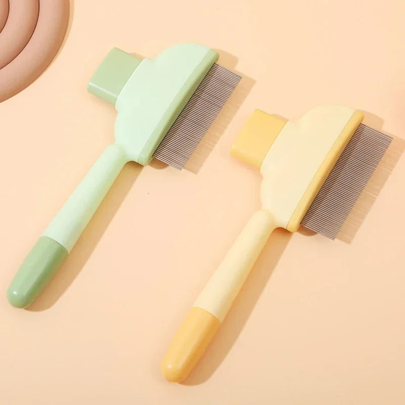 Two pet grooming combs with fine metal teeth, one in sage green and one in pastel yellow, on a beige background.