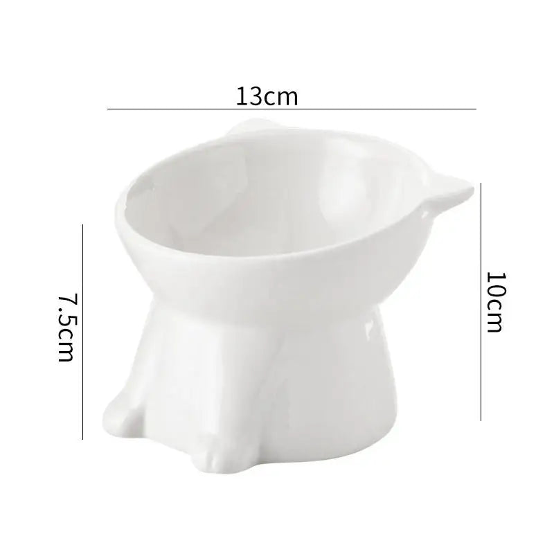White ceramic elevated pet bowl with a 15-degree tilt and cute cat-ear detailing, shown with dimensions.