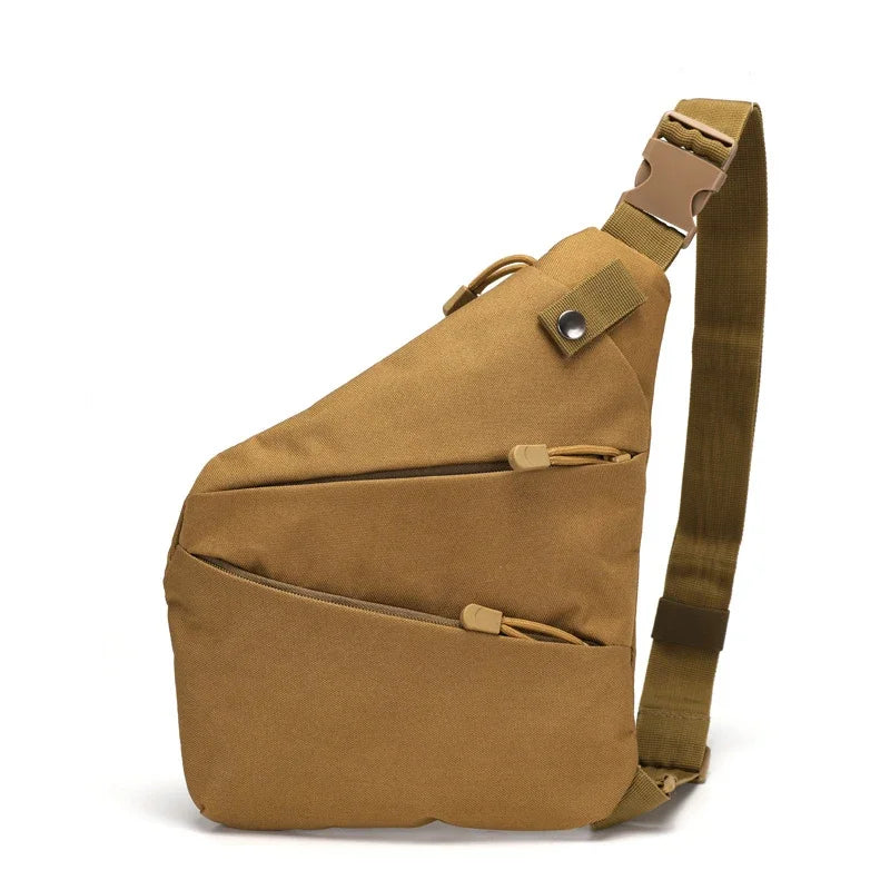 Tan canvas crossbody sling bag with a slim, ergonomic shape, adjustable buckle strap, and two zippered front pockets.
