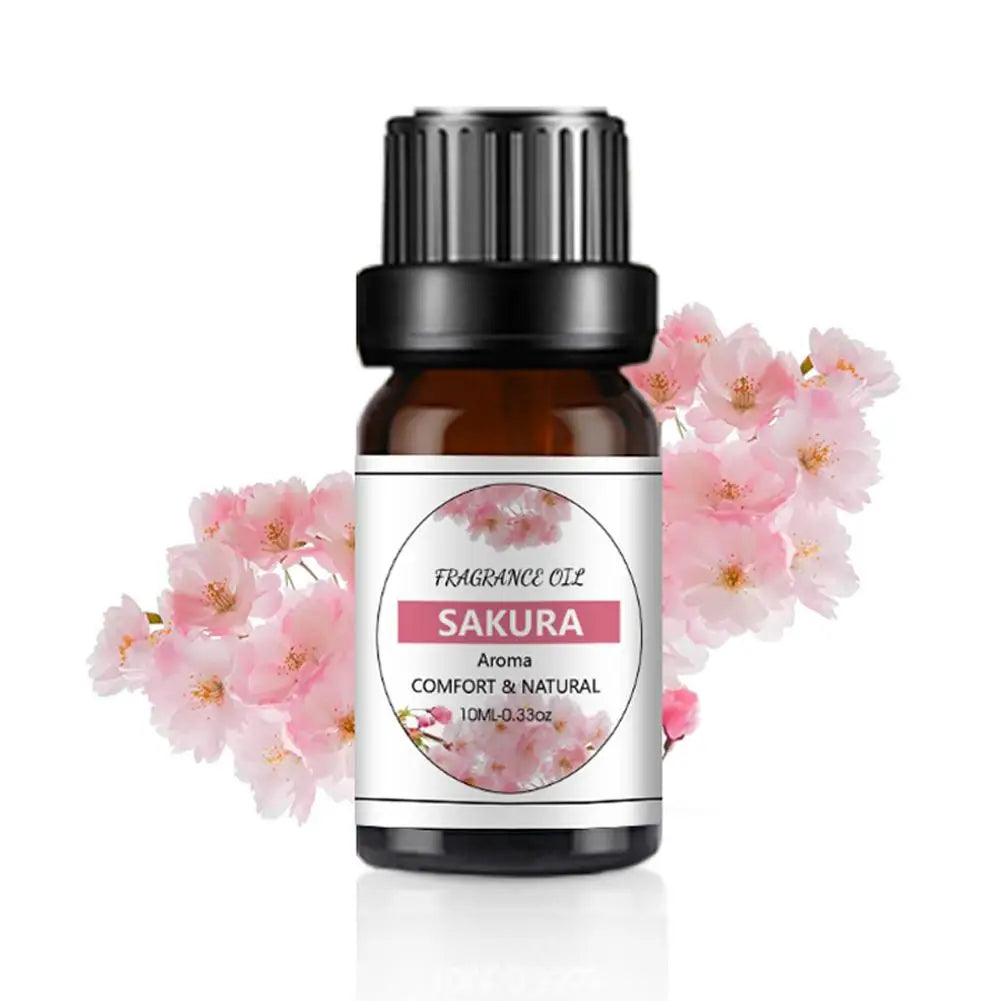 10ml brown glass bottle of Sakura fragrance oil with a black cap, featuring a pink cherry blossom floral design.