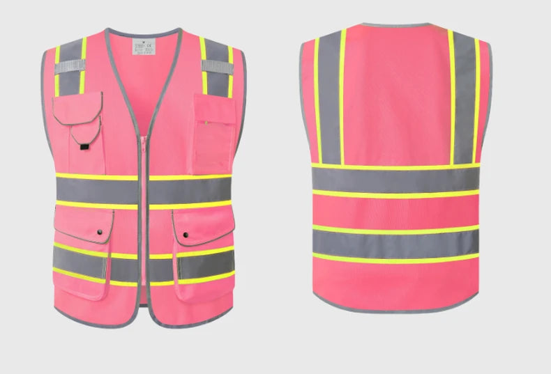 Pink high-visibility utility work vest with reflective strips, multiple front pockets, and a zip fastening.