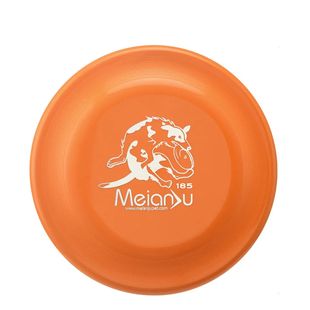 Bright orange, circular plastic dog training disc with a white graphic of a dog catching a frisbee in the centre.