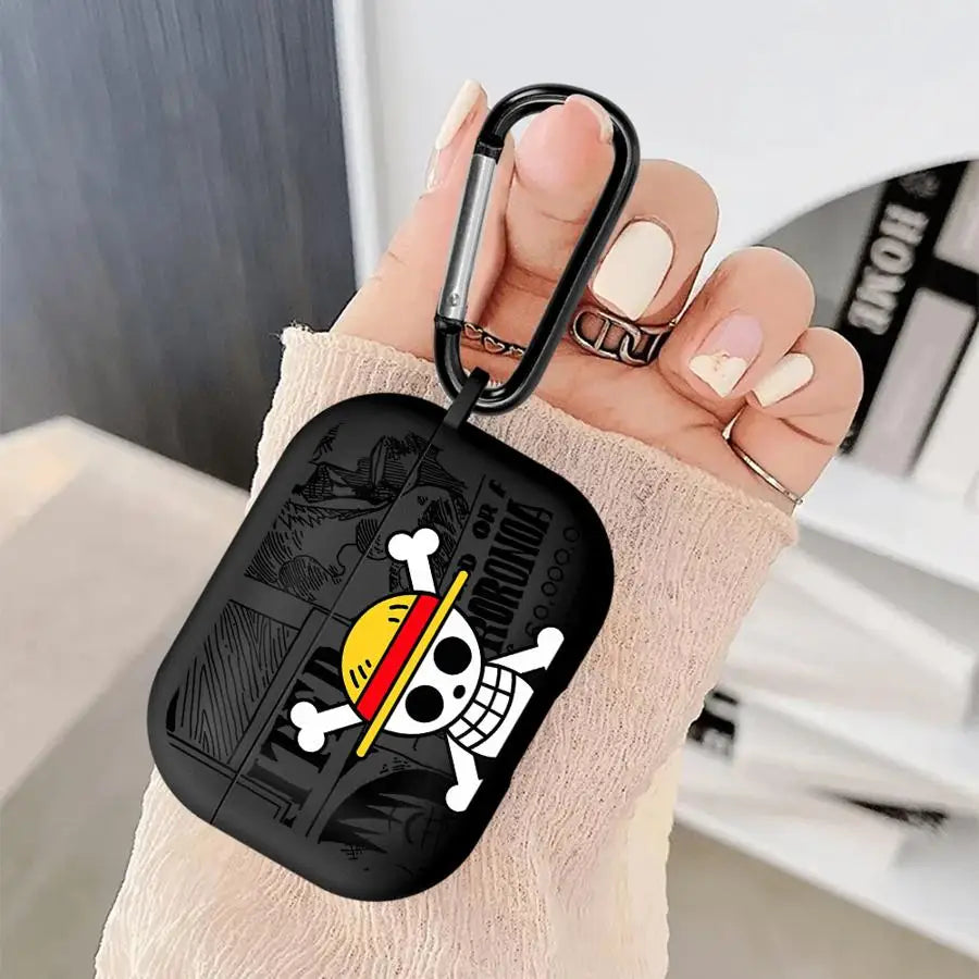 Black silicone AirPods Pro case featuring a One Piece Luffy skull design with a black carabiner clip.