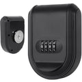 Black metal wall-mounted key lock box with a four-digit combination dial and a circular magnetic mounting base.