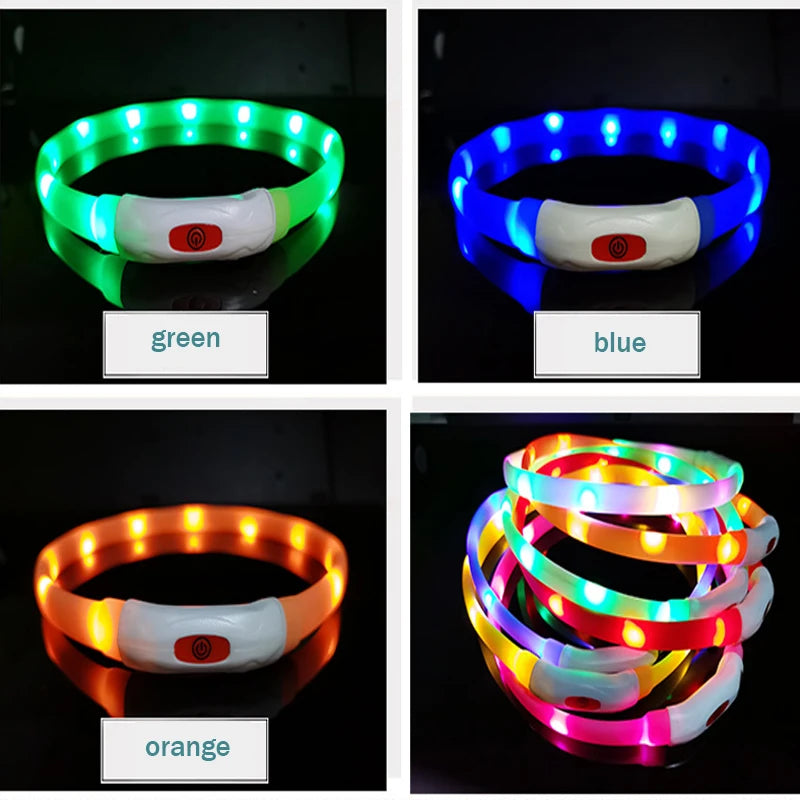 Four glowing silicone LED dog collars in green, blue, orange, and multi-color with a white control box and red power button.