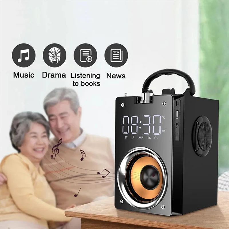 Portable black wooden Bluetooth speaker with a digital clock display, carry handle, and front-facing gold speaker cone.