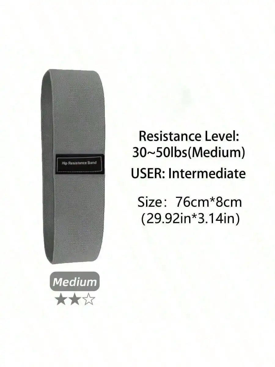 Grey fabric hip resistance band for intermediate use, marked as medium resistance.