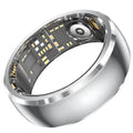 A sleek, silver smart fitness ring, showing the internal health sensors and electronic components on the inner band.