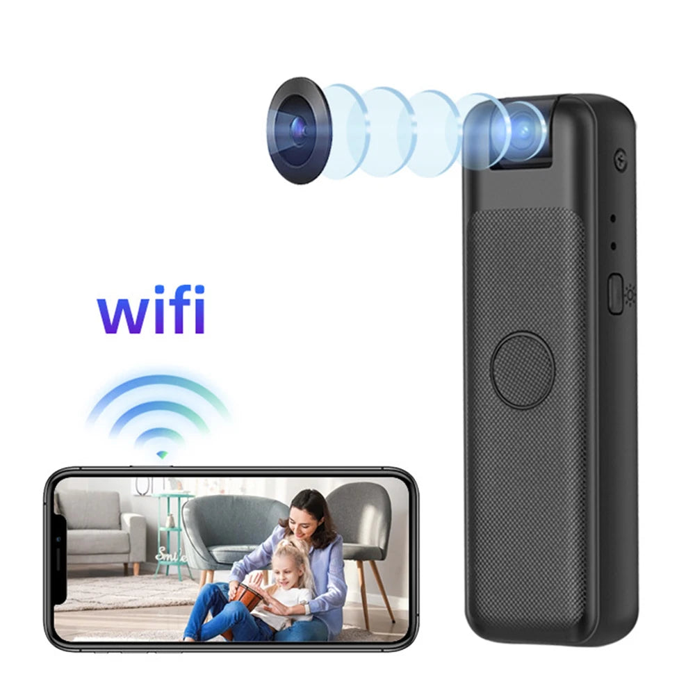 Black, handheld rectangular plastic Wi-Fi security camera with a top lens and phone app viewing display.