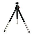 Black and silver compact tabletop tripod with a rotating ball head and adjustable telescopic legs.