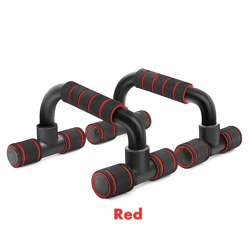 Pair of black push-up bars with red foam-padded handles, set against a white background.