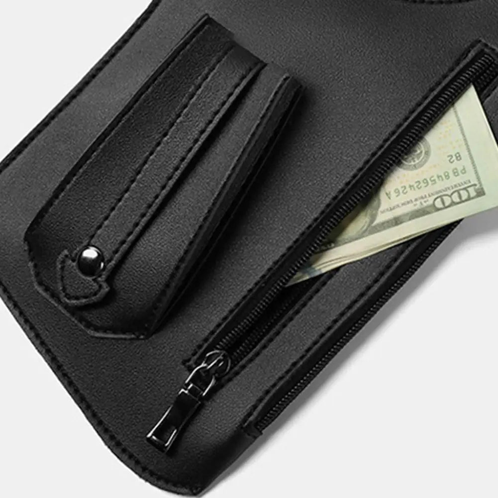 Black retro tactical crossbody bag with a zipped pocket containing a banknote and a secure stud-fastened strap.