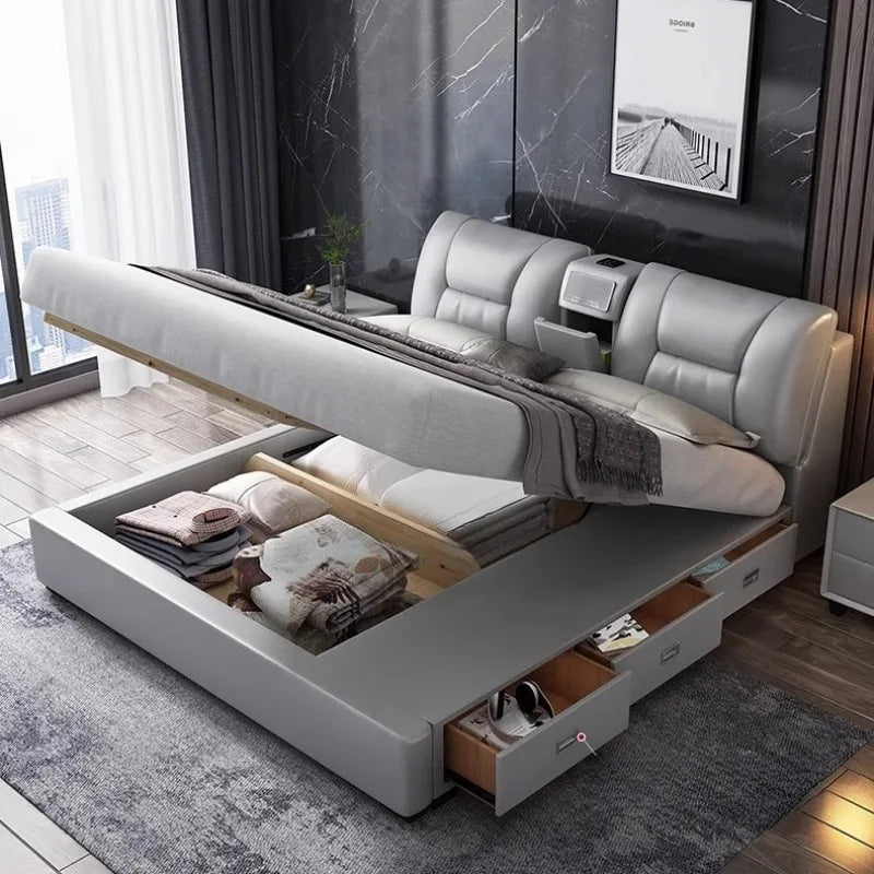 Light grey upholstered king size bed with a gas-lift storage base and integrated side drawers and headboard storage.