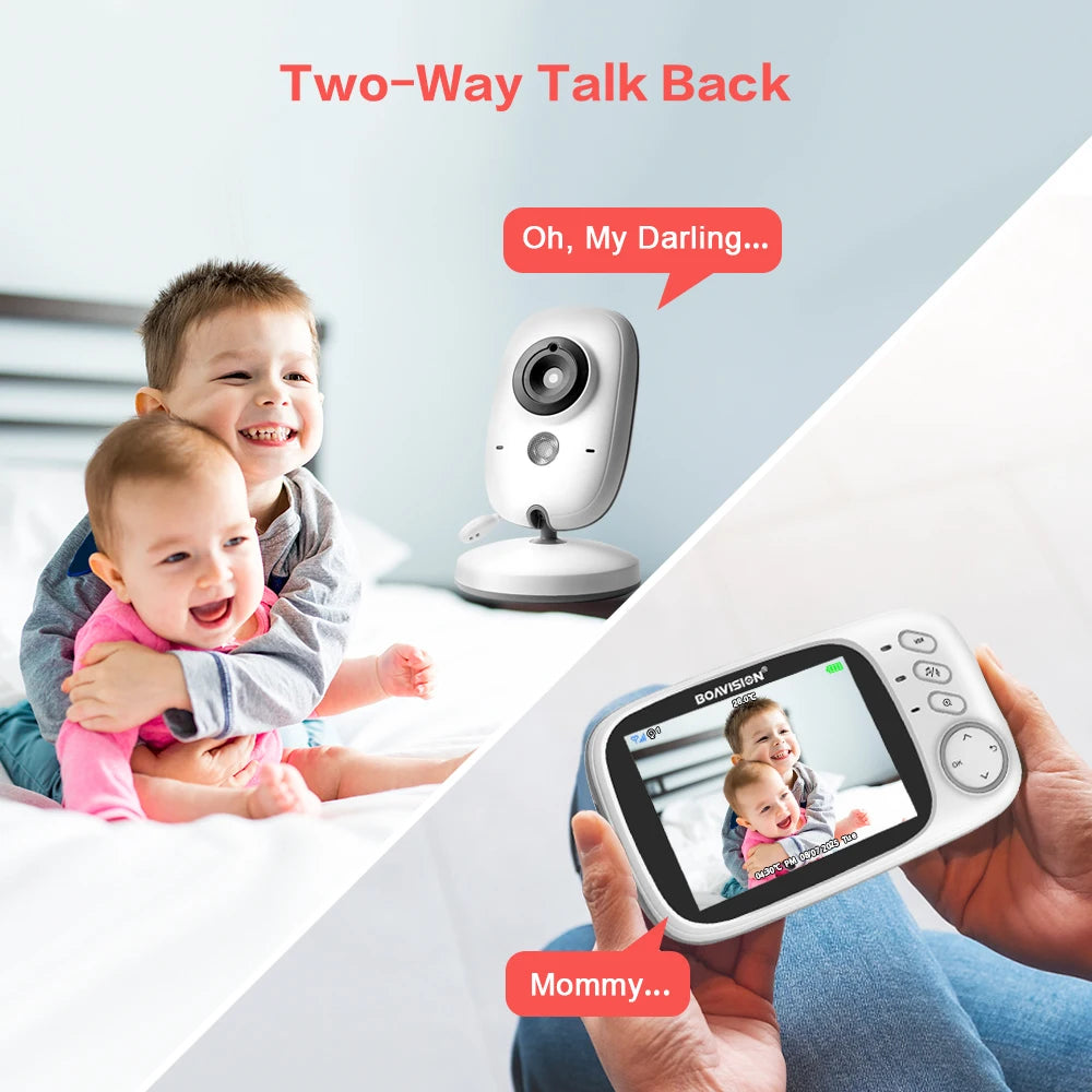 A baby monitor displaying two smiling children on its screen while a camera unit sits nearby.