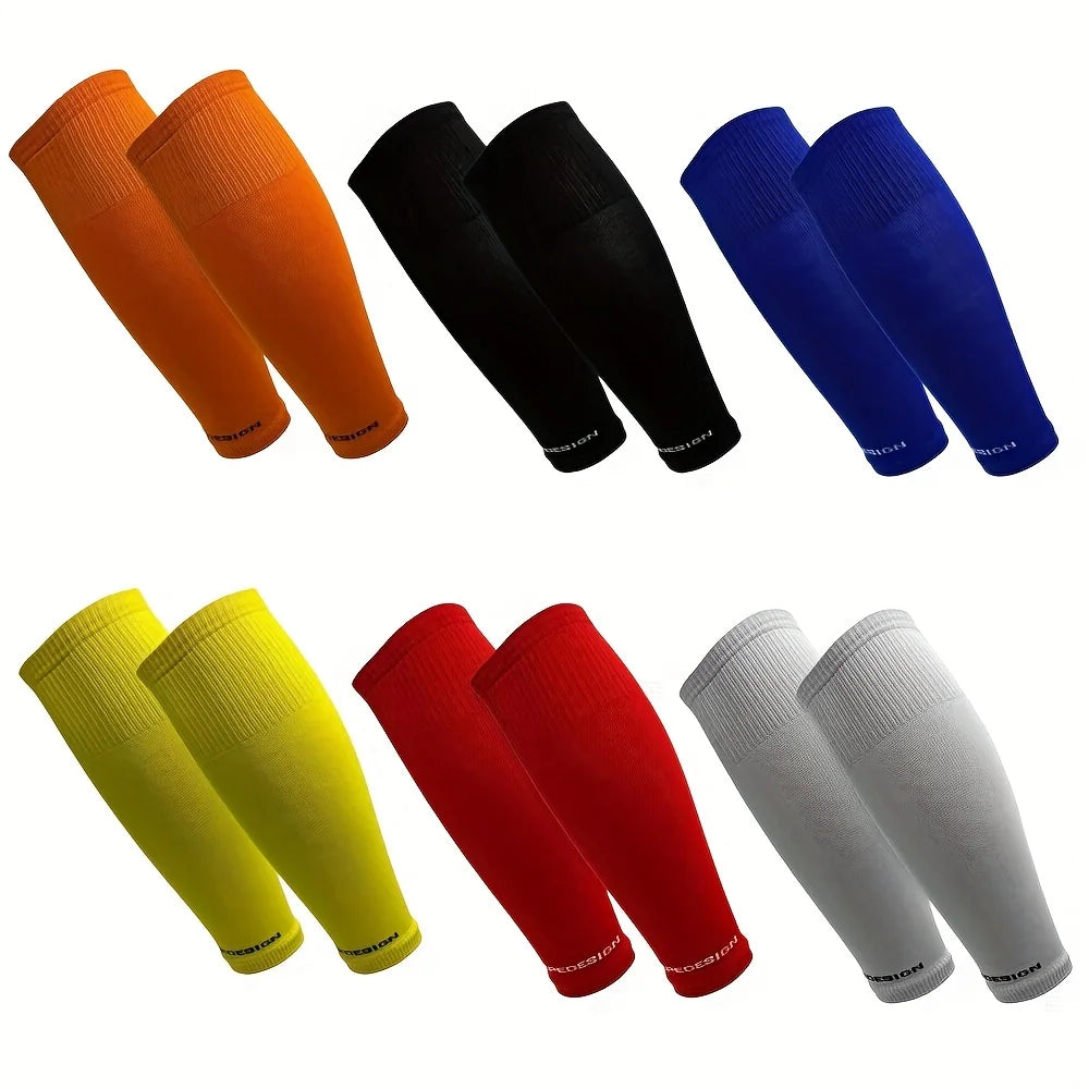 Six pairs of colourful, footless sports socks in orange, black, blue, yellow, red, and white.