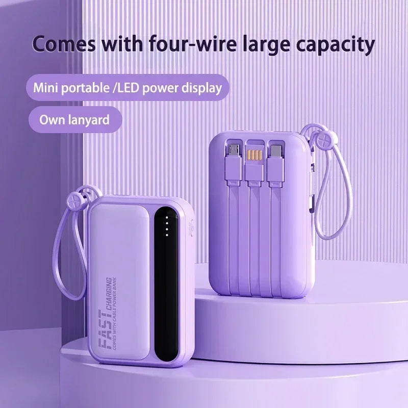Compact purple power bank with built-in cables, an LED power display, and a matching carry lanyard.