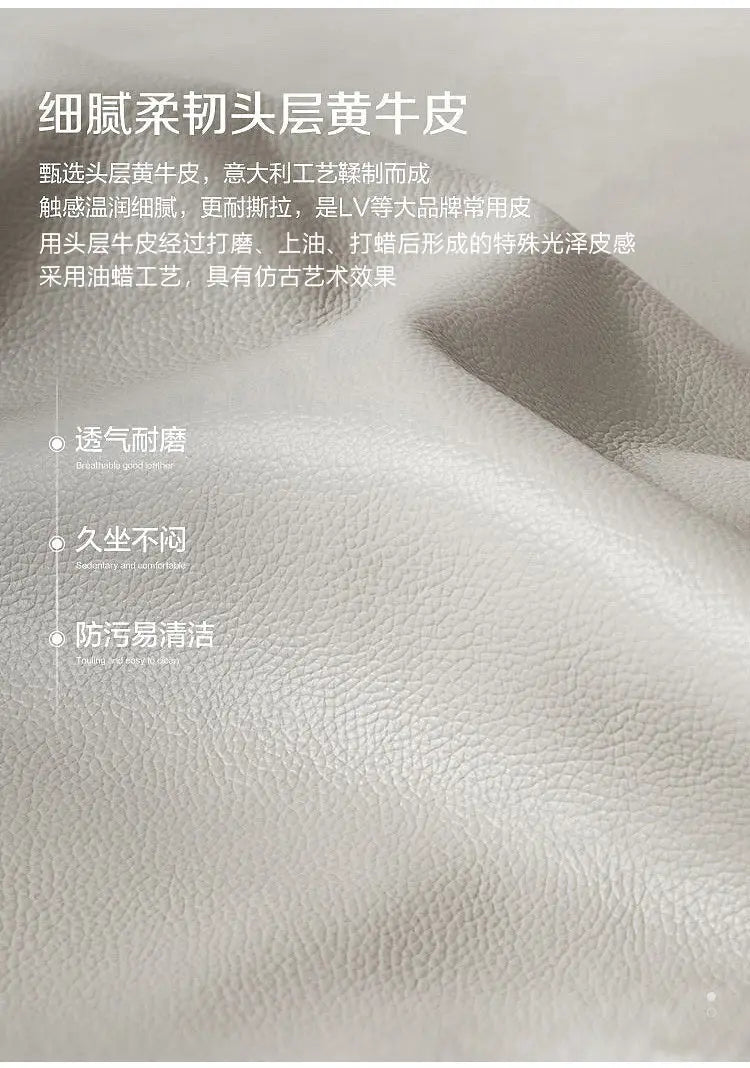 Close-up of premium, light grey textured leather with a soft, durable, and easy-clean finish.