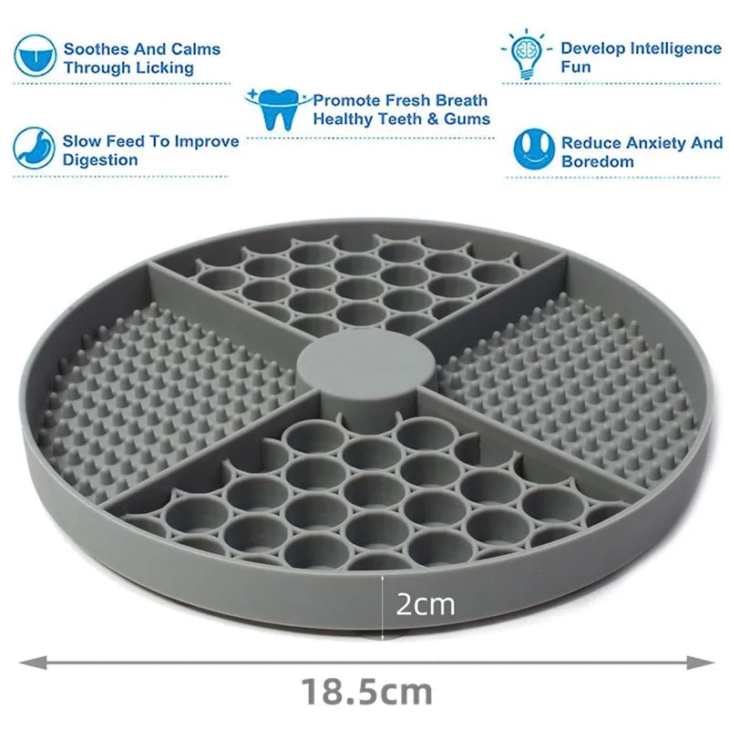 Grey round silicone pet slow feeder mat with four textured quadrants for licking, calming, and improved digestion.