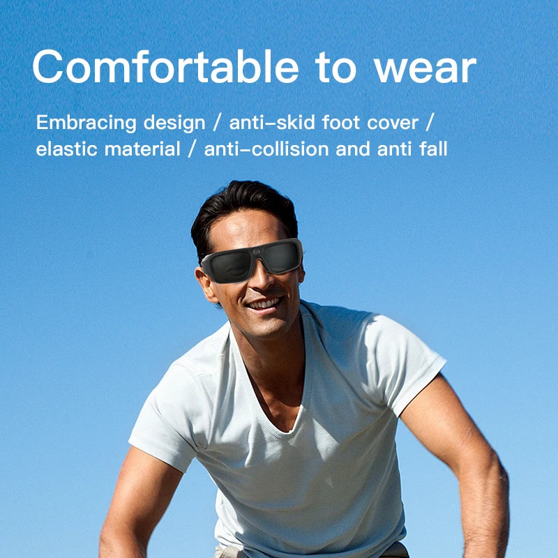 Man wearing black, elastic, anti-skid, impact-resistant sunglasses against a blue sky.