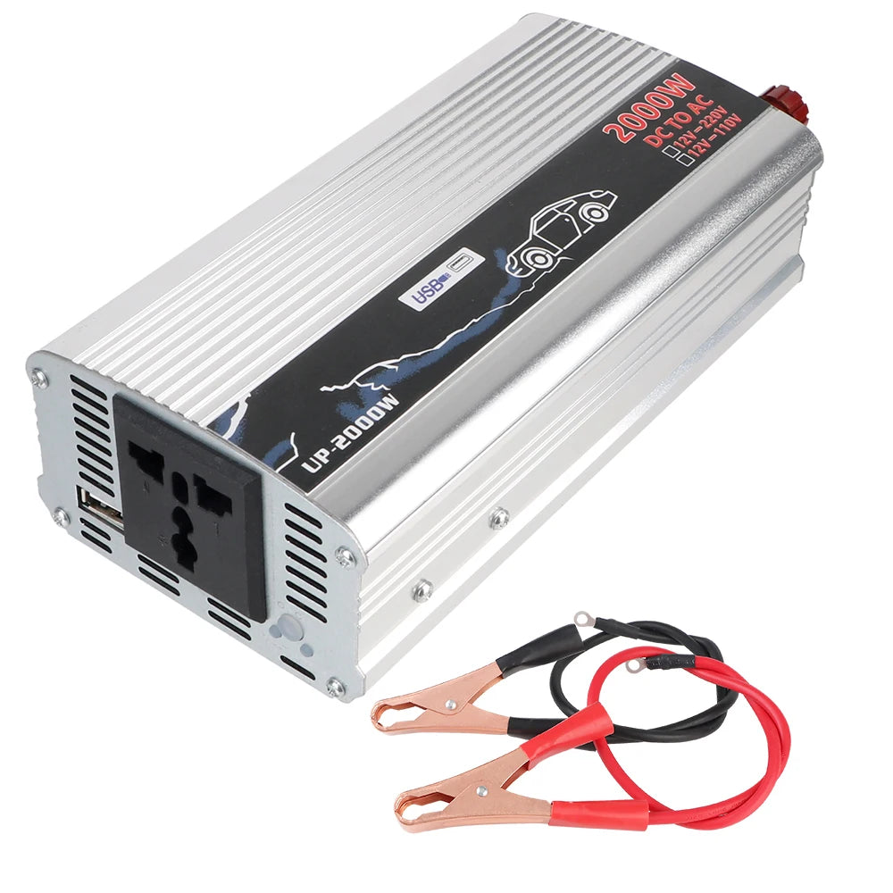 Silver 2000W car power inverter with AC socket, USB port, and red and black battery connection cables.
