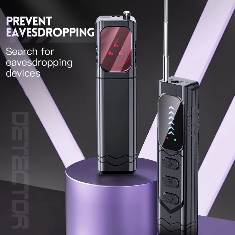 Two sleek black portable privacy detectors with extendable antennas and digital displays on purple circular pedestals.