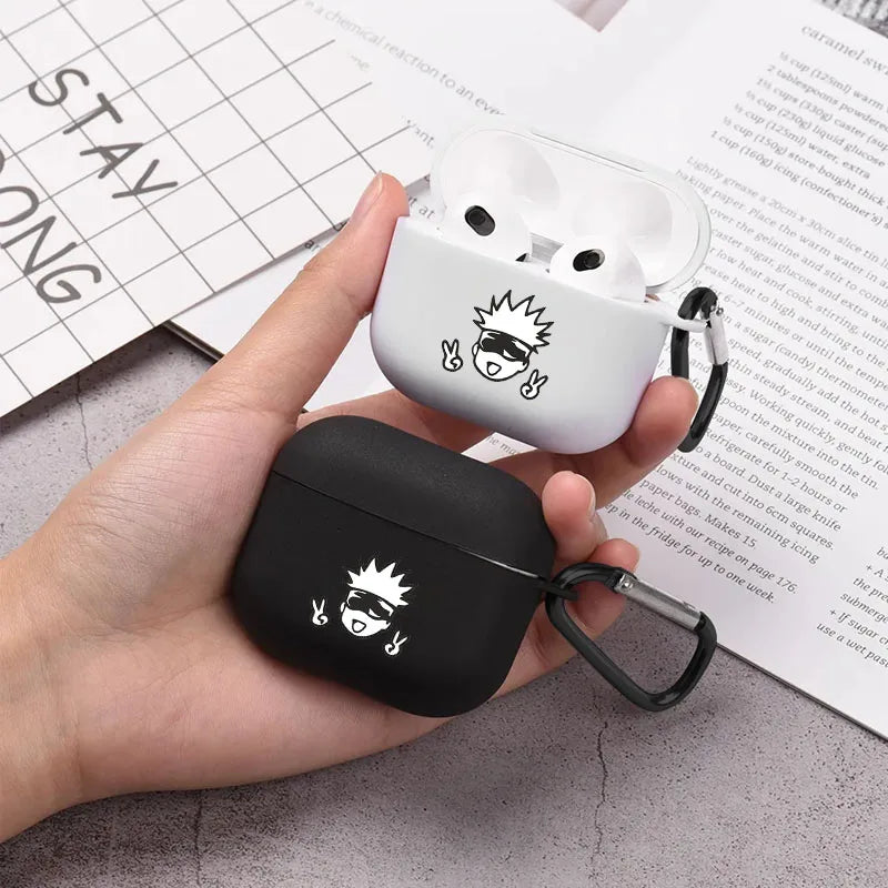 Black and white silicone AirPods 3 cases with Gojo anime print, held in hand with carabiner clips.