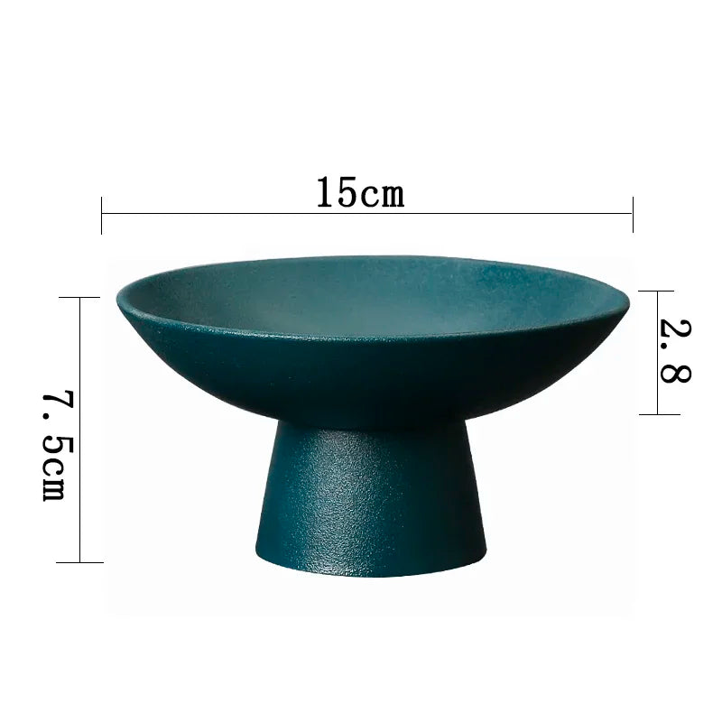 Dark teal decorative pedestal bowl with a textured matte finish, 15cm wide and 7.5cm tall.