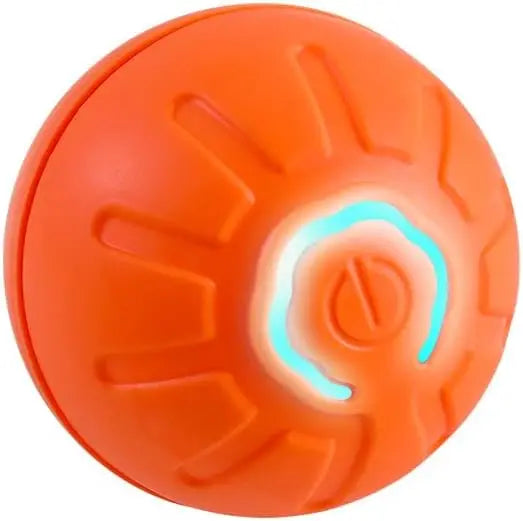 Bright orange interactive pet ball with a glowing light-up power button and sun-ray textured surface.