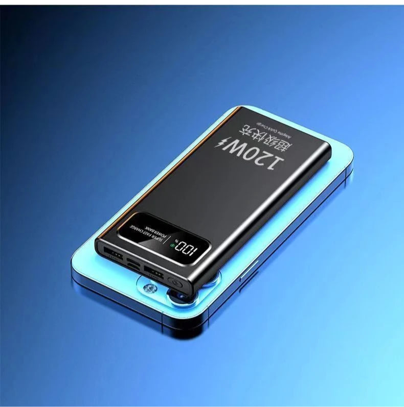 Black 20000mAh portable power bank with digital display, showing 100% charge resting on a light blue smartphone.