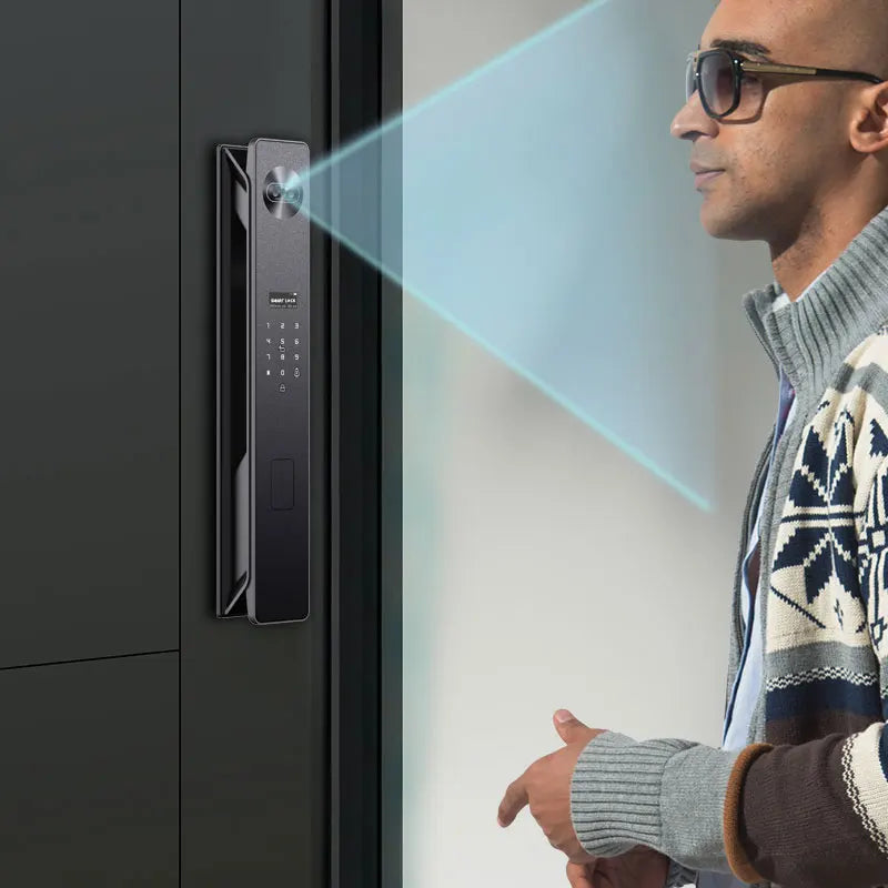 Black metal smart door lock with a digital keypad and biometric facial recognition sensor being used by a man.