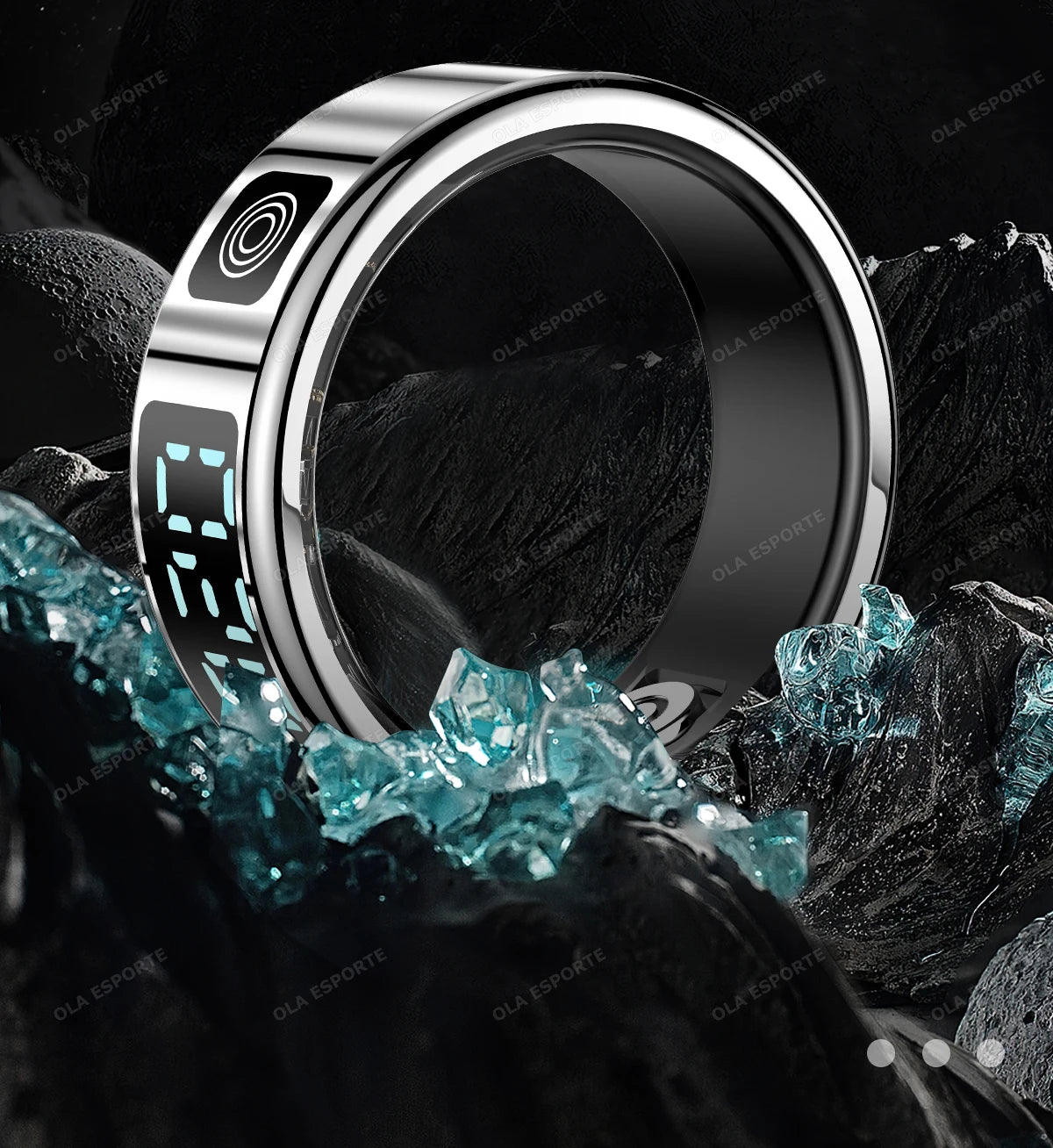 Sleek silver smart health tracking ring with a digital display, set against dark rocks and glowing blue crystals.
