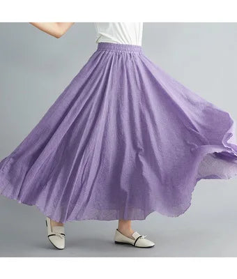 Flowing lavender maxi skirt with an elasticated waistband and gathered, lightweight fabric.