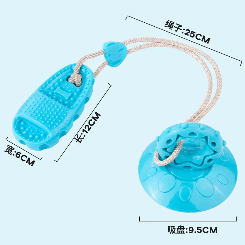 Blue interactive dog toy with a textured suction cup base and a chew toy connected by a 25cm rope.