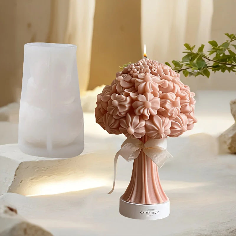 Pink floral bouquet pillar candle with a bow and matching white silicone mold.