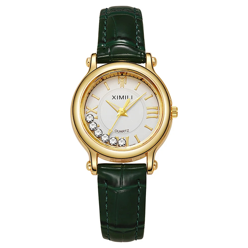 Women's quartz watch with a dark green leather strap, gold-tone casing, white dial and crystal accents.