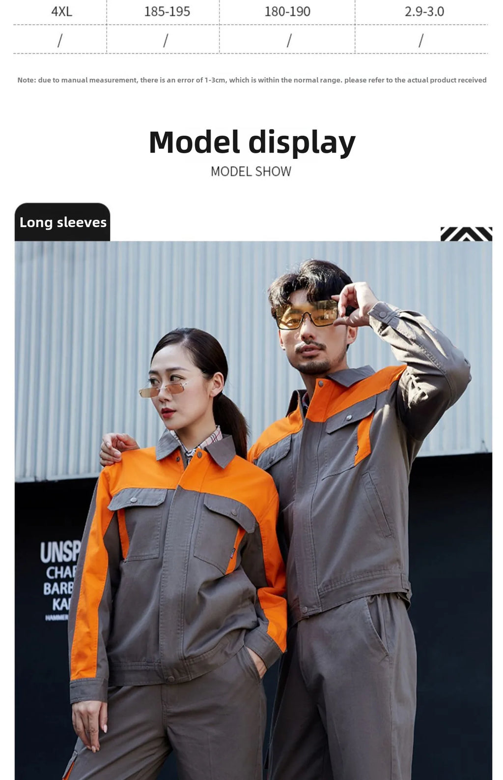 A man and woman wearing matching grey and orange long-sleeve work jackets with button-flap chest pockets.