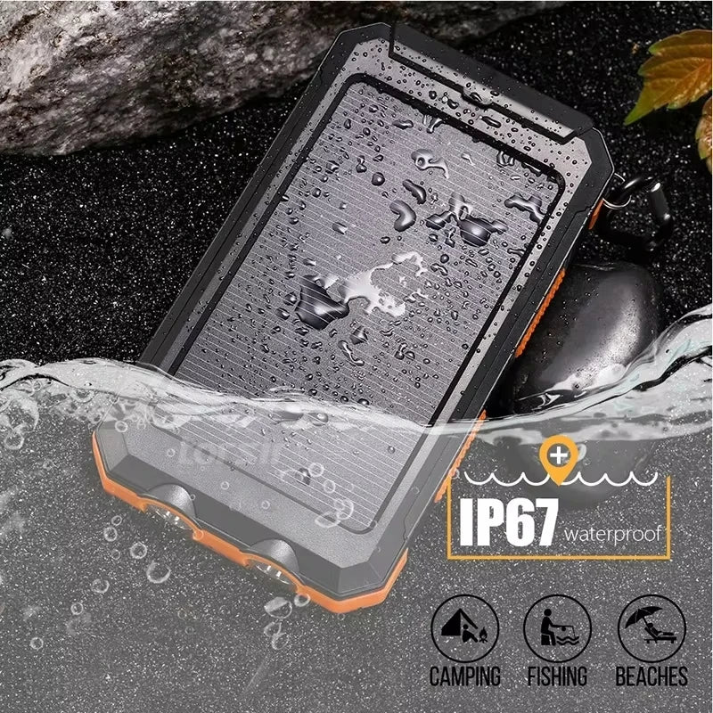 Rugged black and orange waterproof solar power bank with built-in LED light, half-submerged in water.