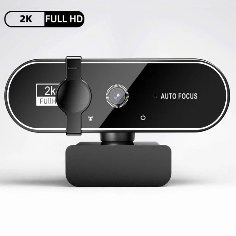 Black, sleek 2K Full HD autofocus webcam with privacy cover and built-in microphone on a sturdy monitor stand.