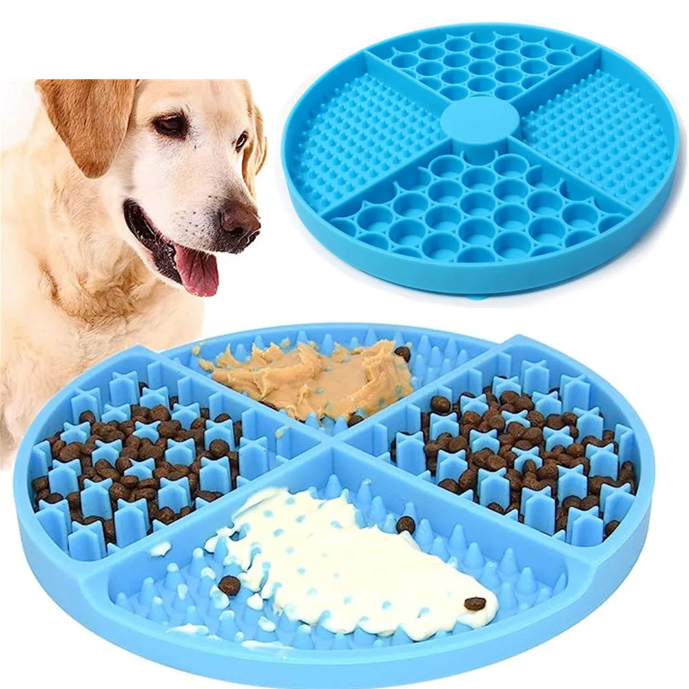 Blue silicone slow-feeder pet bowl with divided sections for food and treats, shown with a dog.