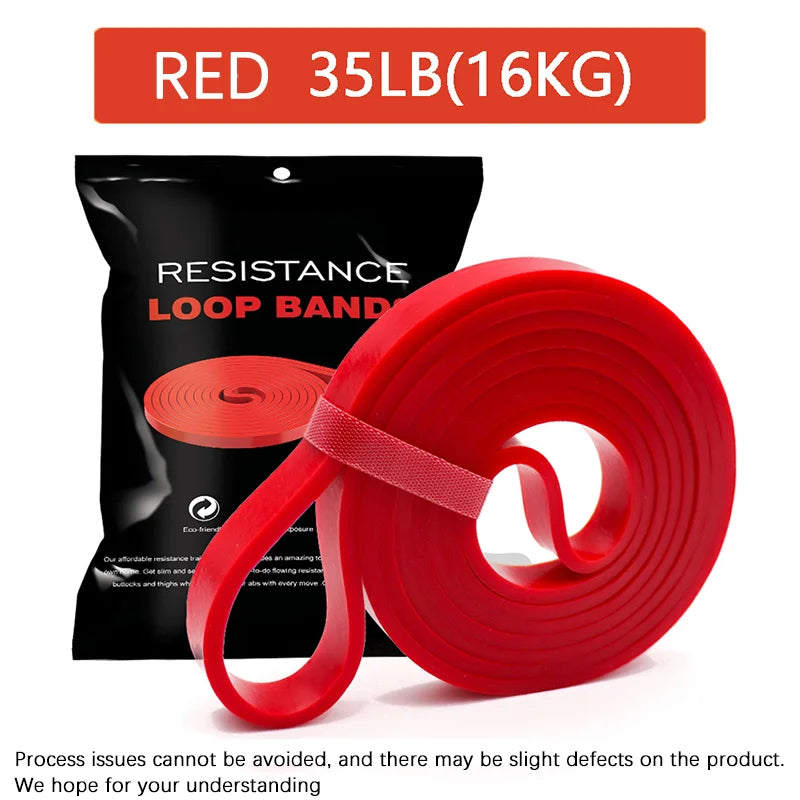 A red, heavy-duty resistance loop band, 35lb (16kg) strength, coiled in front of its branded black retail packaging.