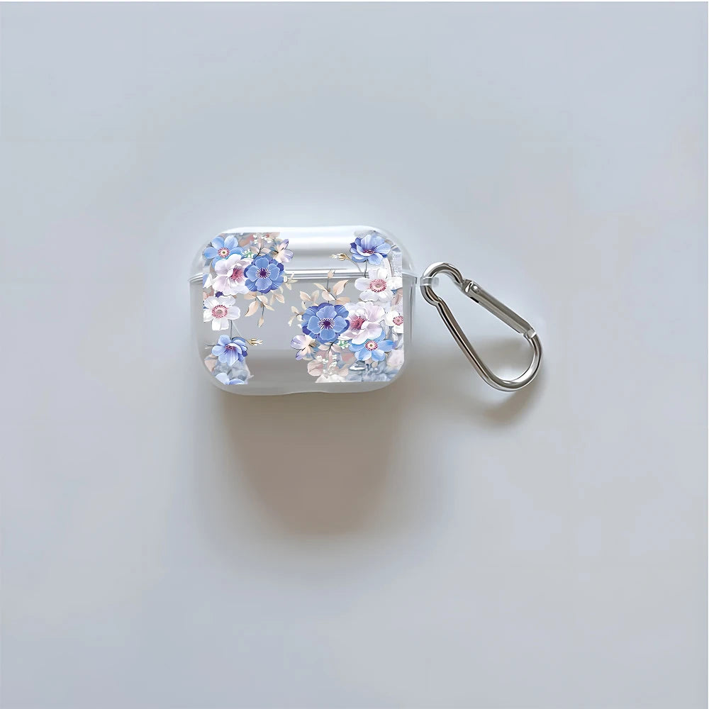 Clear AirPods Pro case featuring a blue floral print and a silver carabiner clip.