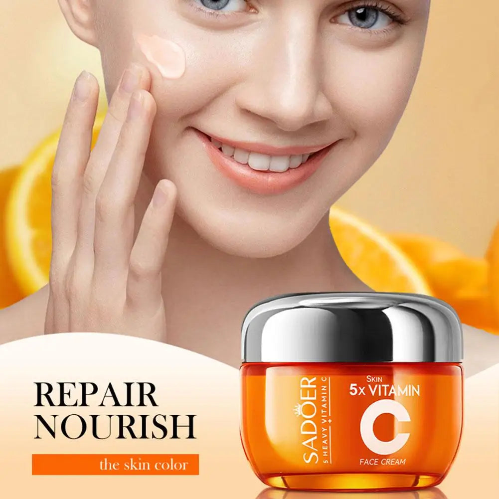 Bright orange Vitamin C face cream jar, featuring a silver lid, for skin repair and nourishment.
