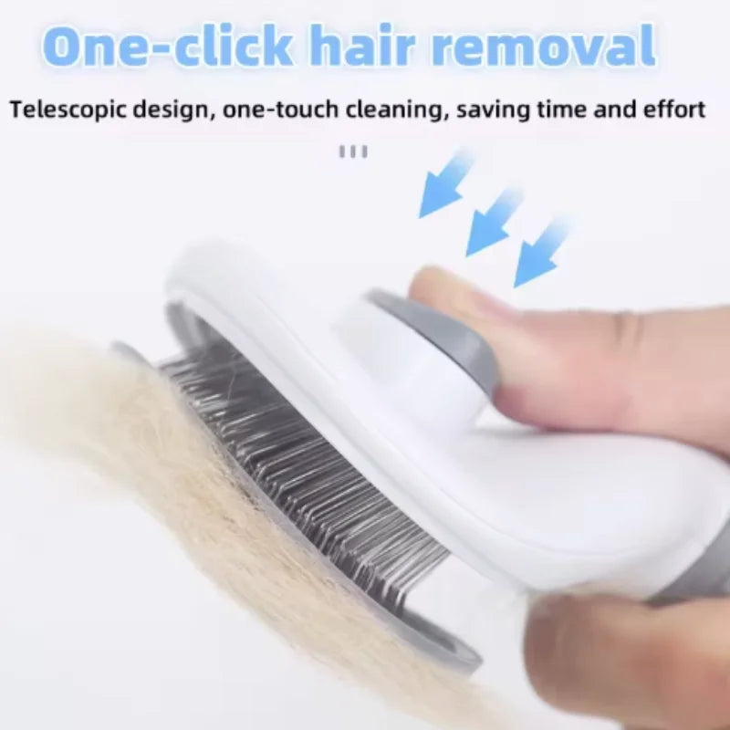 White and grey self-cleaning pet grooming slicker brush with metal bristles removing a clump of fur.