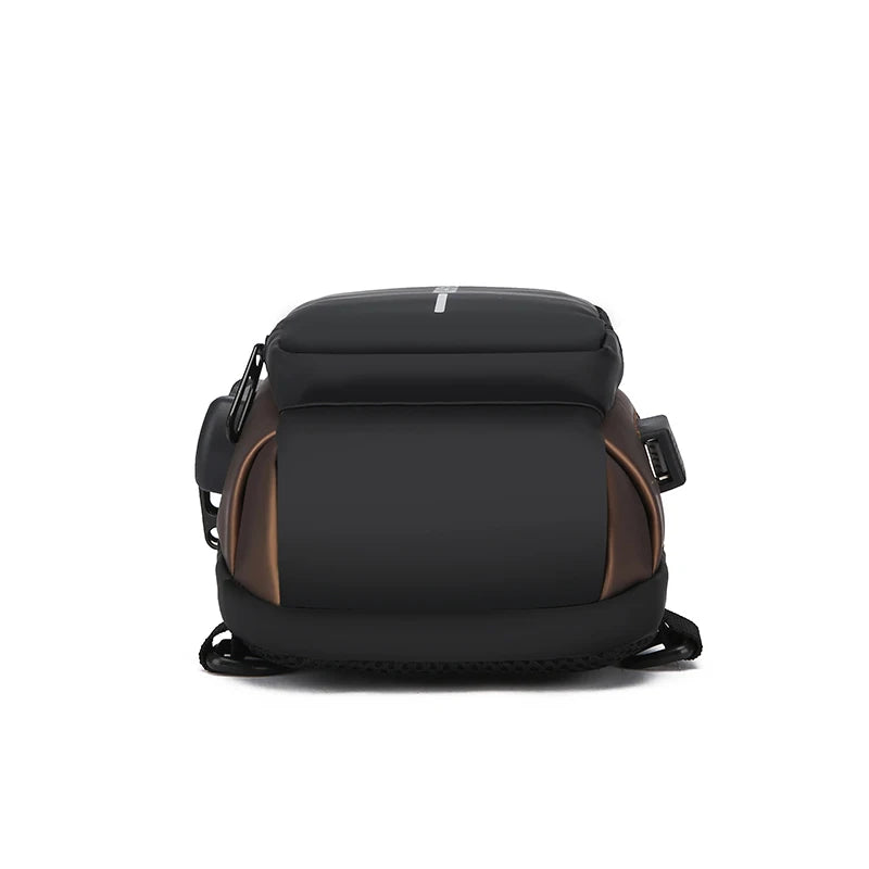 Black and brown anti-theft crossbody chest bag with side USB charging port.